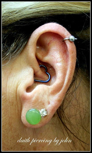 Explore hook tattoo ideas, creative tattoo ideas in Fort Myers, available at Tiger Lotus Tattoo and Piercing