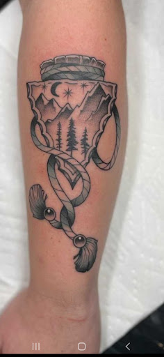 Explore damaged tattoo ideas, creative tattoo ideas in Senoia, available at Messenger Tattoo Studio