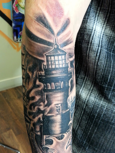 Explore stained glass tattoo ideas, creative tattoo ideas in Buffalo, available at Madd Ink Tattoo & Piercing