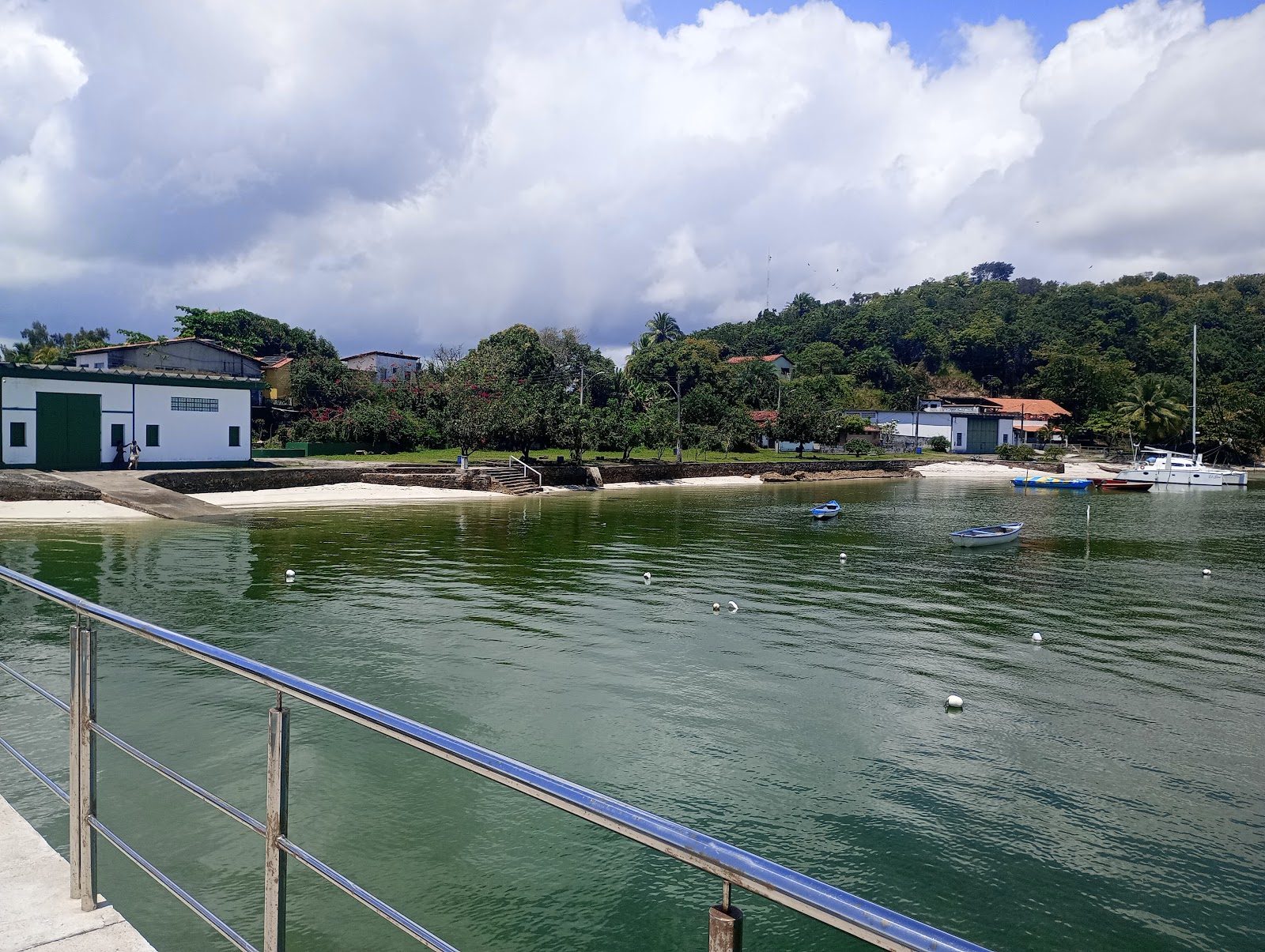 Foto von Praia da Barra do Paraguacu mit beiger sand Oberfläche