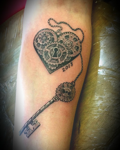 Explore name tattoos ideas for guys, creative tattoo ideas in North Woodstock, available at Kellys Tattoo