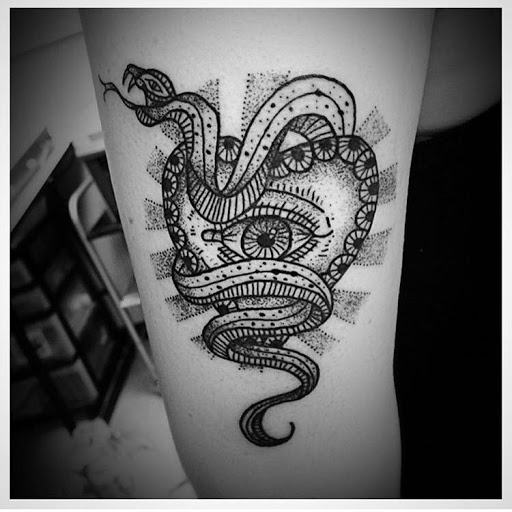 Explore tribal tattoo ideas for guys, creative tattoo ideas in Hamden, available at Burning Hearts Tattoo Co.