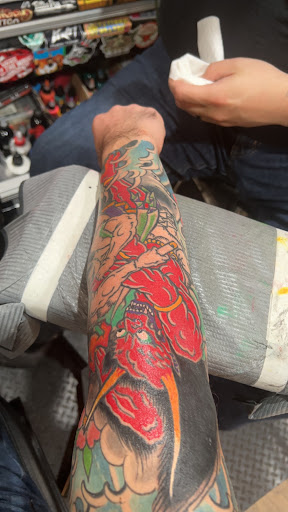 Explore small neck tattoo ideas, creative tattoo ideas in Pikeville, available at Sacred Mountain Tattoo