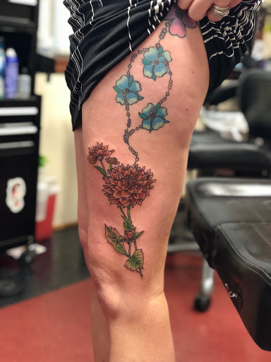 Explore scar cover up tattoo ideas, creative tattoo ideas in Charlottesville, available at Mystic Tattoo and Body Piercing