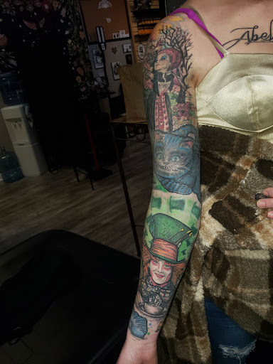 Explore lion forearm tattoo ideas, creative tattoo ideas in Linn Creek, available at Hillard Skillard Tattoos, LLC.