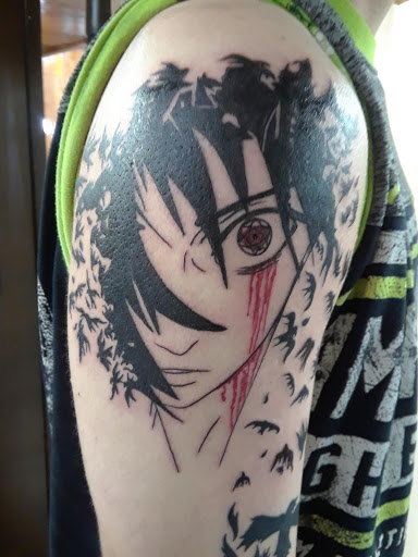 Explore back tattoo ideas for men, creative tattoo ideas in Jasper, available at Jimi Buddhas Tattoo Emporium