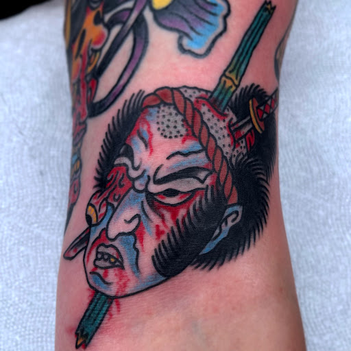 Explore half and half tattoo ideas, creative tattoo ideas in Johnson City, available at Gold Cross Tattoo Co.