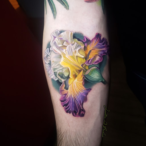 Explore roman numeral tattoo ideas for guys, creative tattoo ideas in Worcester, available at Studio 31 Tattoo Social Club