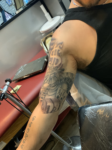 Explore vertical tattoo ideas, creative tattoo ideas in Waterville, available at MADD INK Tattoo & Piercing Studio