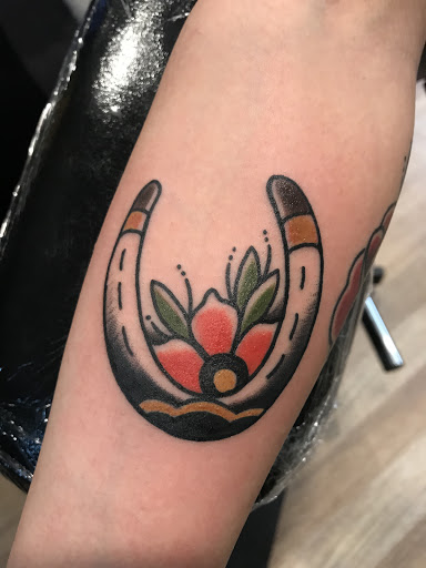 Explore black widow tattoo ideas, creative tattoo ideas in Winter Park, available at Overlook tattoo company