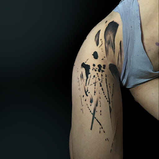 Explore doc holliday tattoo ideas, creative tattoo ideas in Washington, available at Trilogy Atelier - DC Tattoo Shop Piercing Studio