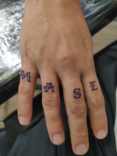 Explore tattoo ideas for a son's name, creative tattoo ideas in Davenport, available at Fine Ink Studios Tattoos
