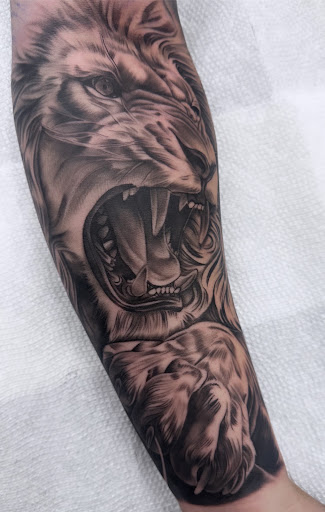 Explore simple neck tattoo ideas, creative tattoo ideas in La Habra, available at Raining Ink Tattoo Studio