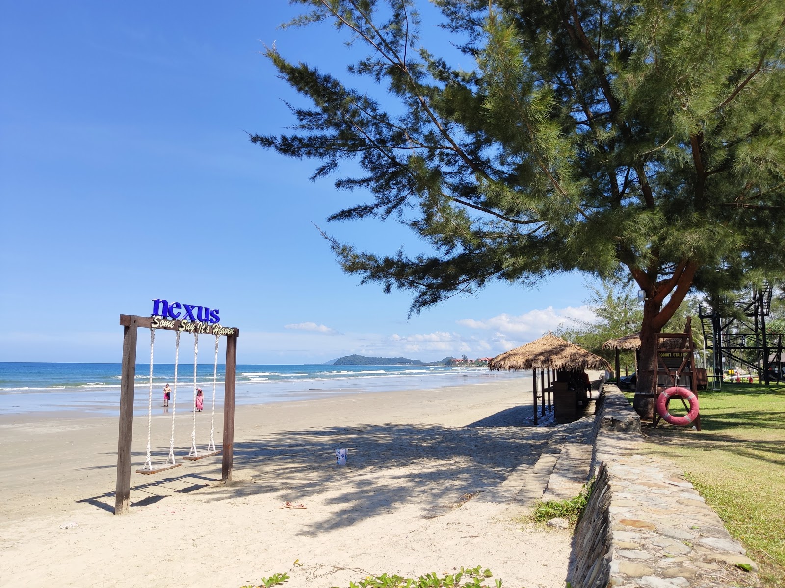 Foto von Nexus Resort Beach mit beiger sand Oberfläche