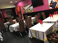Atmosphère du Restaurant indien RESTAURANT TANDOORI HOUSE VENiSSIEUX - n°8