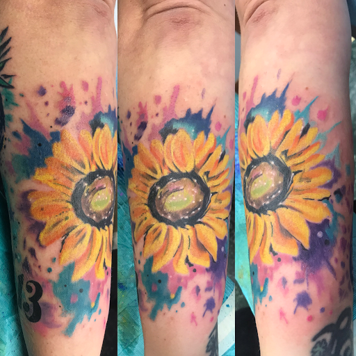 Explore female stomach tattoo ideas, creative tattoo ideas in Aurora, available at Ronin Tattoo Studio INC