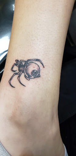 Explore tattoo ideas on lower stomach, creative tattoo ideas in Punxsutawney, available at DarkStar Tattoo