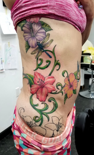 Explore small back tattoo ideas, creative tattoo ideas in Hawthorne, available at Artistic Vision Ink Tattoo And Body Piercing