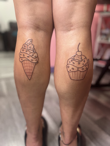 Explore mother son tattoos ideas, creative tattoo ideas in Sylvania, available at The Tattoo Shop