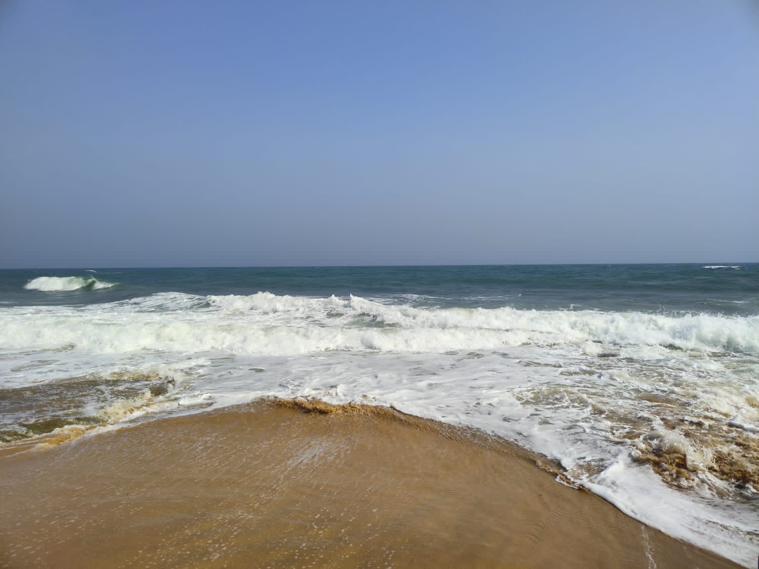 Foto de Manapad Beach - lugar popular entre os apreciadores de relaxamento