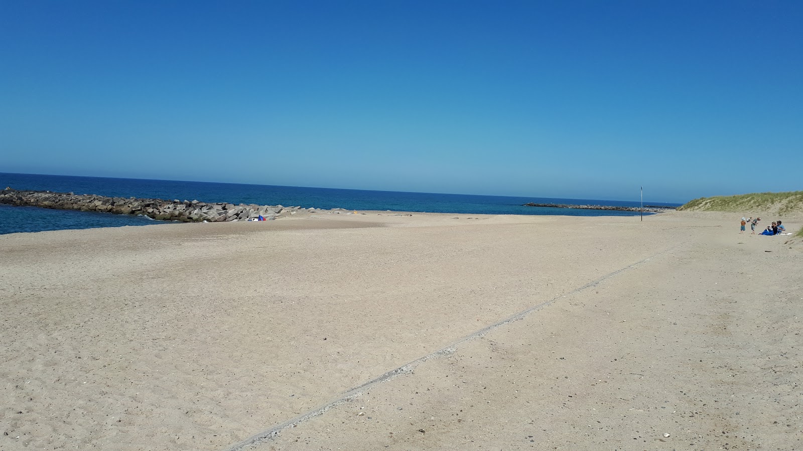 Agger Tange Beach的照片 带有明亮的沙子表面