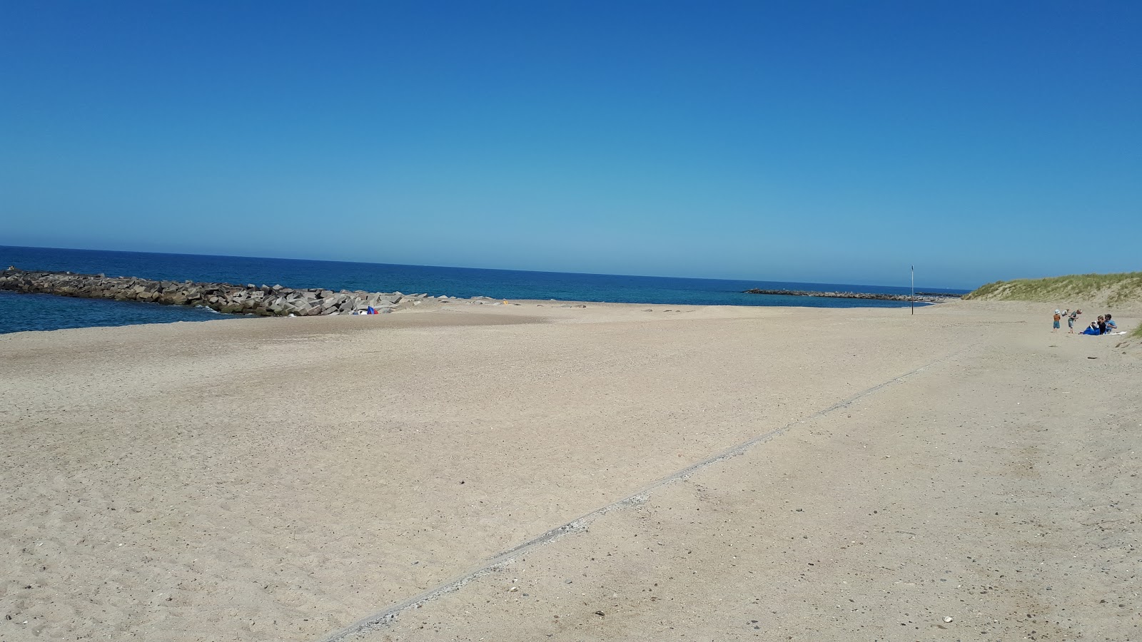 Foto de Agger Tange Beach com areia bege superfície