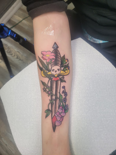 Find women's rib tattoo ideas for your next unique tattoo in Ocala at The Tattoo Gallery of Ocala LLC