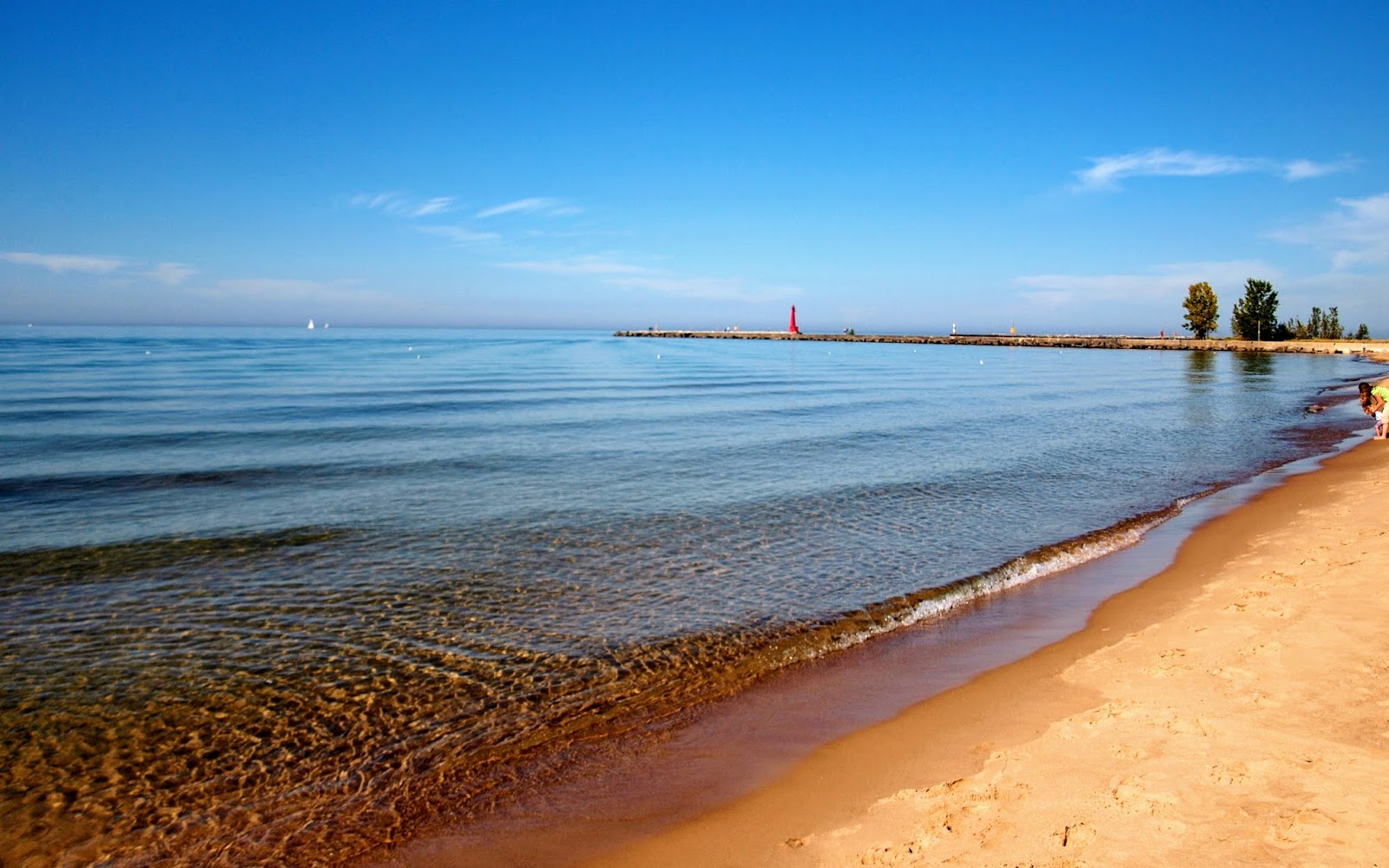 North Pier Side Beach'in fotoğrafı - rahatlamayı sevenler arasında popüler bir yer