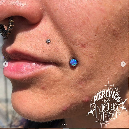 Explore communist tattoo ideas, creative tattoo ideas in Oshkosh, available at Piercings by Molly Moon at 920 Tattoo and Piercing