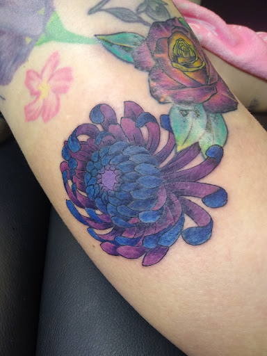 Explore tombstone movie tattoo ideas, creative tattoo ideas in New Braunfels, available at To The Moon Tattoo Studio