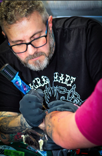 Explore skull and rose tattoo ideas, creative tattoo ideas in Manchester, available at Sacred Heart Tattoos