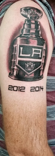 Explore wolf neck tattoo ideas, creative tattoo ideas in Venice, available at House of Ink