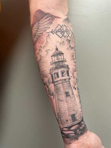 Find tattoos with letters ideas for your next unique tattoo in Cambridge at Kaleidoscope Tattoo & Art Gallery