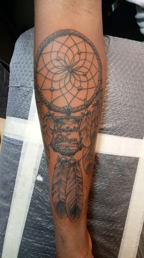 Explore cover up tattoo ideas for women, creative tattoo ideas in Augusta, available at Mr. Tattoo