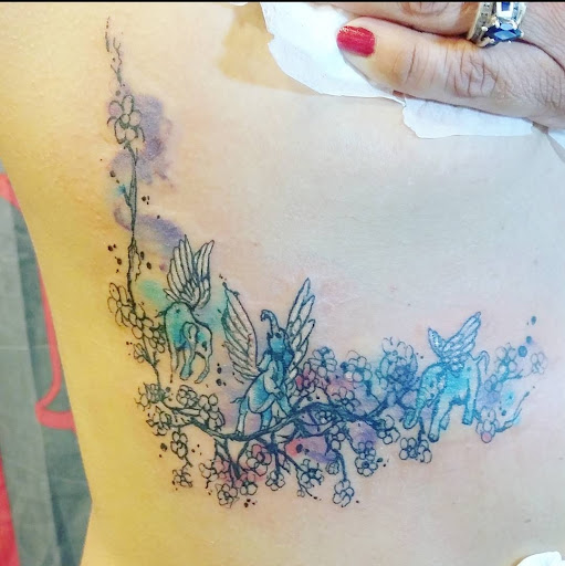 Explore mens tattoos on wrist ideas, creative tattoo ideas in Benton, available at Spectrum Tattoo