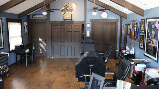 Explore back tattoo cover up ideas, creative tattoo ideas in Clayton, available at Black Wolf Tattoos