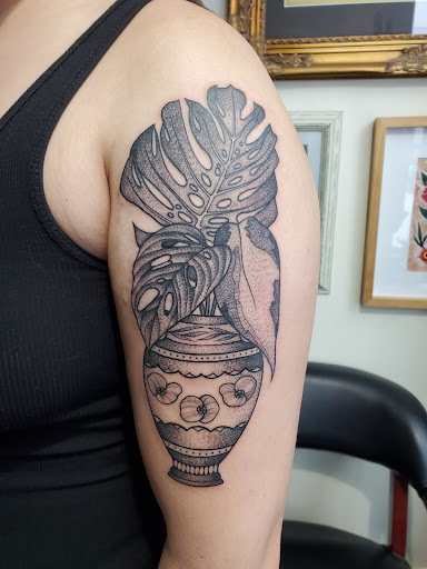 Explore tooled leather tattoo ideas, creative tattoo ideas in Fargo, available at No Coast Tattoo