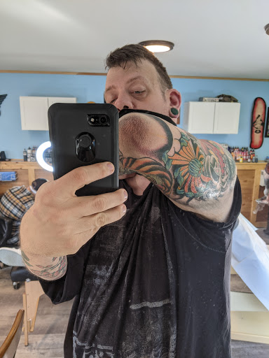 Explore triangle tattoo ideas, creative tattoo ideas in Powell, available at Hummingbird Tattoo Studio