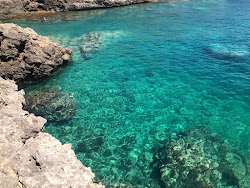 Torre Uluzzo Beach'in fotoğrafı küçük koy ile birlikte