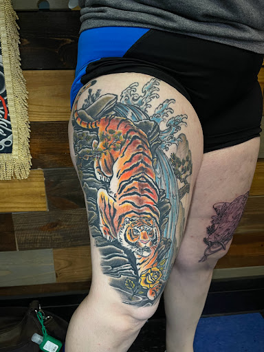 Explore red string tattoo ideas, creative tattoo ideas in Talbott, available at Alpha Tattoo co.