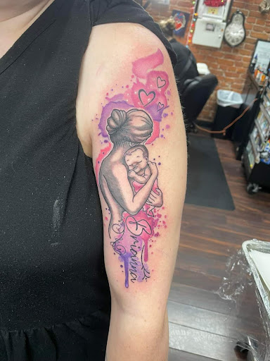 Explore christian forearm tattoo ideas, creative tattoo ideas in Dubuque, available at The Crows Nest