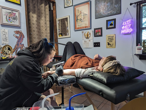 Explore name cover up tattoo ideas for men, creative tattoo ideas in Saint Augustine, available at Ms. Deborahs Fountain of Youth Tattoo & Body Piercing