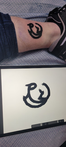 Explore bald head tattoo ideas, creative tattoo ideas in Orange Park, available at Big City Tattoo and Piercing