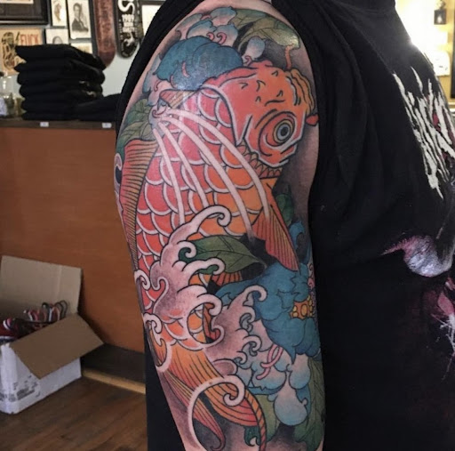 Explore music tattoo ideas for females, creative tattoo ideas in Buffalo, available at Grey Havens Tattoo