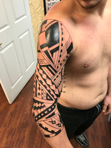 Explore snowmobile tattoo ideas, creative tattoo ideas in Seymour, available at American Gypsy Tattoo Corp.