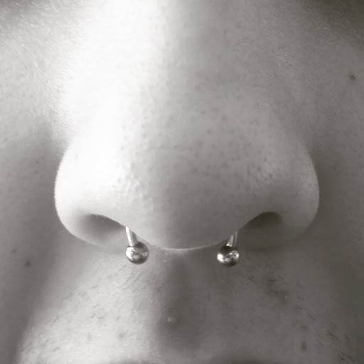 Explore ambigram tattoo ideas, creative tattoo ideas in Albuquerque, available at Staceys Exotic Body Piercing and Tattoo