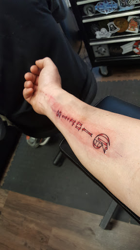 Explore grandpa tattoos ideas, creative tattoo ideas in Fargo, available at 46 & 2 Tattoo