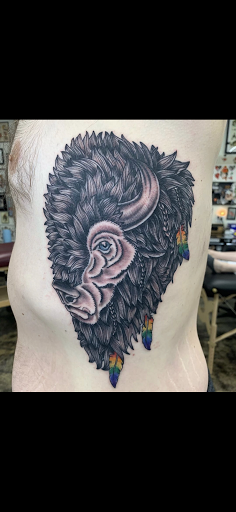 Explore snake tattoo ideas, creative tattoo ideas in Sioux Falls, available at Heart Tattoo