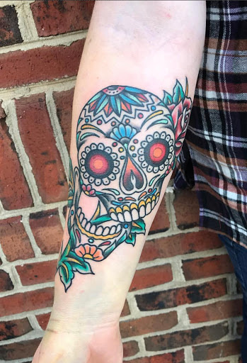 Explore cover up tattoo ideas female wrist, creative tattoo ideas in Matthews, available at Divine Arts Tattoo Company