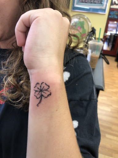 Explore painting tattoo ideas, creative tattoo ideas in Erie, available at Ink Assassins